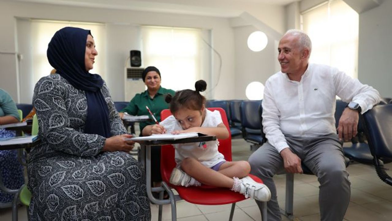 Down Sendromlu kızı için okuma yazma öğrendi