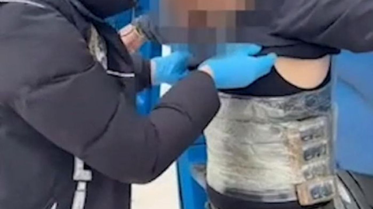 Beline sardığı uyuşturucuyla yakalandı