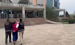 77 Yıl Hapis Cezasıyla Aranan Firari Kurye Kılığındaki Polise Yakalandı