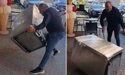 Satın aldığı bulaşık makinesi teşhir ürünü çıkınca mağazanın önüne attı