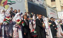 Gazze'de 54 çift savaşın gölgesinde dünya evine girdi