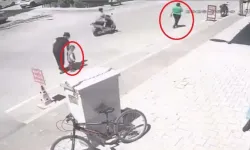 2 yaşındaki çocuğu, sokak ortasında tekmeledi