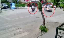 Motosiklet ile otomobilin çarpıştığı kaza kamerada; 2 yaralı