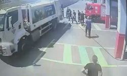 Yanan çöp kamyonunu itfaiye istasyonuna sürdü