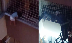Balkon filesine takılan çocuğu itfaiye kurtardı