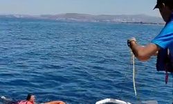 Kuşadası'nda akıntıyla açığa sürüklenen kadını deniz polisi kurtardı