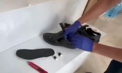 Metamfetamini ayakkabısının tabanına gizlemiş