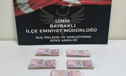 Tapu satışı sonrası düşürülen parayı bulup aldı; o anlar kamerada