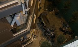 Otomobil, 15 metre yükseklikten bahçeye düştü