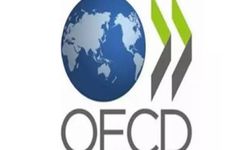 OECD, küresel büyüme tahminini yükseltti