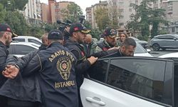Çöp toplayıcı kılığına girerek kaçmaya çalışmış