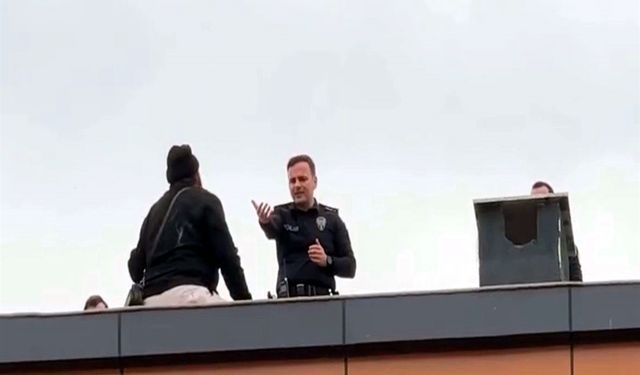 Çatıya Çıkan Kapıcıyı Başkomiser İkna Etti