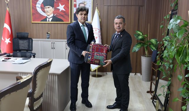 Türk Ocakları Mersin Şube Başkanı Faruk Mersin, Müdür Muhammed Özdemirci'yi Ziyaret Etti