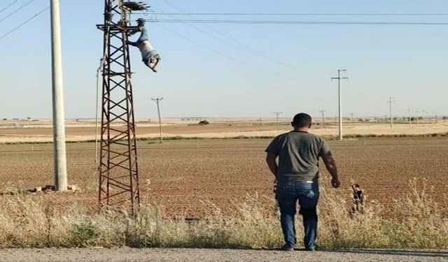 Elektrik akımına kapılan işçi baş aşağı asılı kaldı