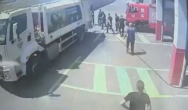 Yanan çöp kamyonunu itfaiye istasyonuna sürdü