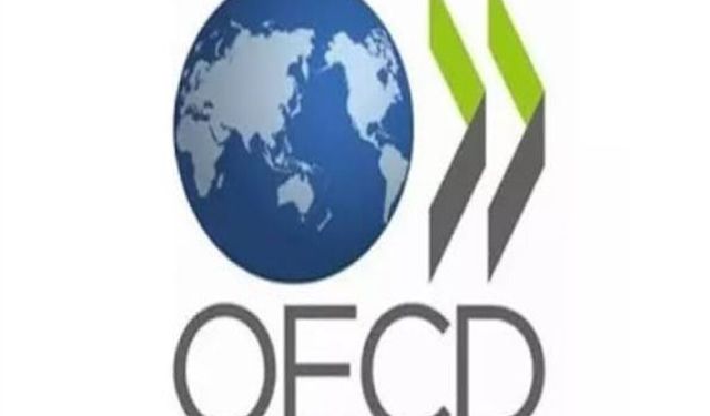 OECD, küresel büyüme tahminini yükseltti