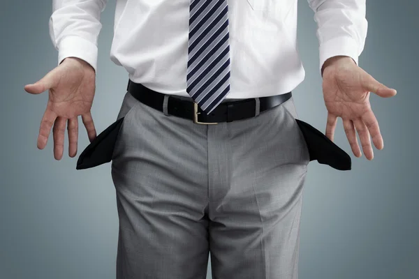 Depositphotos 70909289 Stock Photo Businessman Showing Empty Pockets